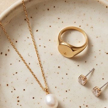 Pearl pendant and signet ring